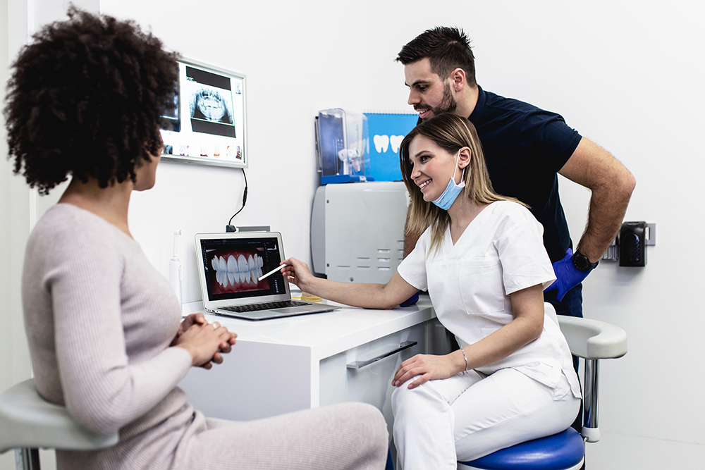 Beautiful young African woman at dentist's office.