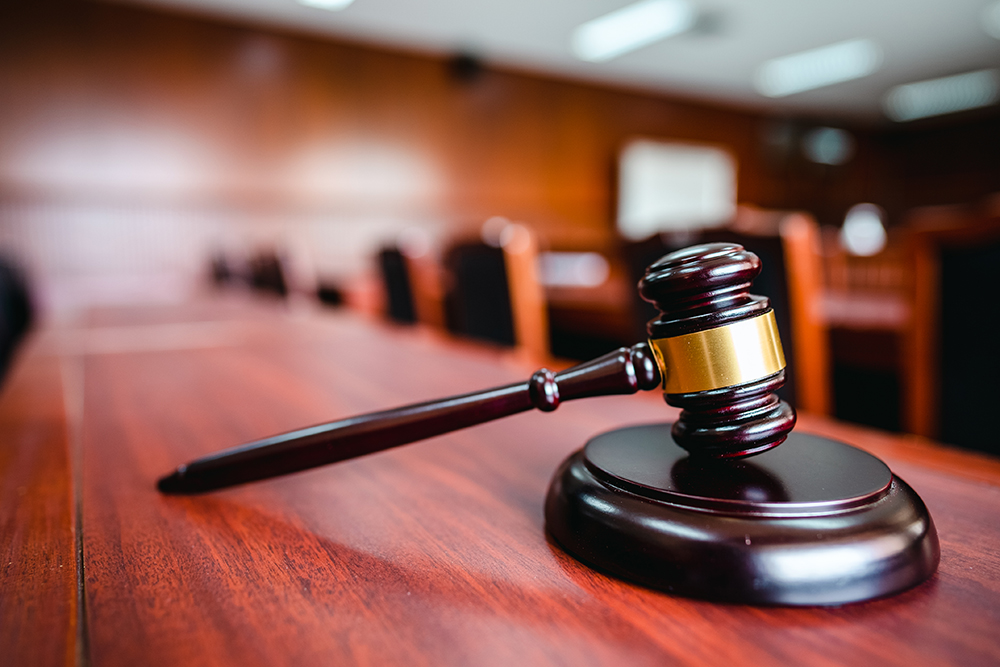 Wooden court gavel on wood table in courtroom,judge and trial. Auction. Law and Justice, Legality concept, Judge.